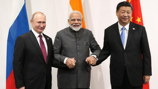 Hand in Hand, Eye to Eye: Modi, Putin and Xi’s Rare Moment Shakes Global Politics