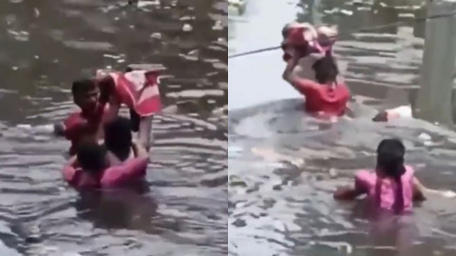 UP Flood: Parents Seen Lifting Baby Overhead Through Waist-Deep Water in Prayagraj