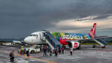 AirAsia flight forced to make emergency landing after passenger strips down to underwear, threatens 