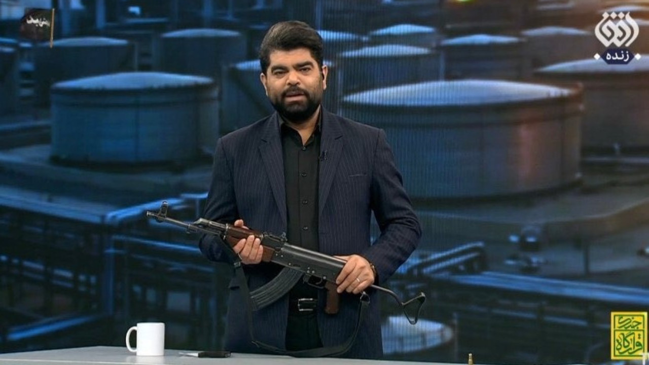 Drama in Iranian Newsroom as Anchor Opens Fire on UAE Flag with AK-47
