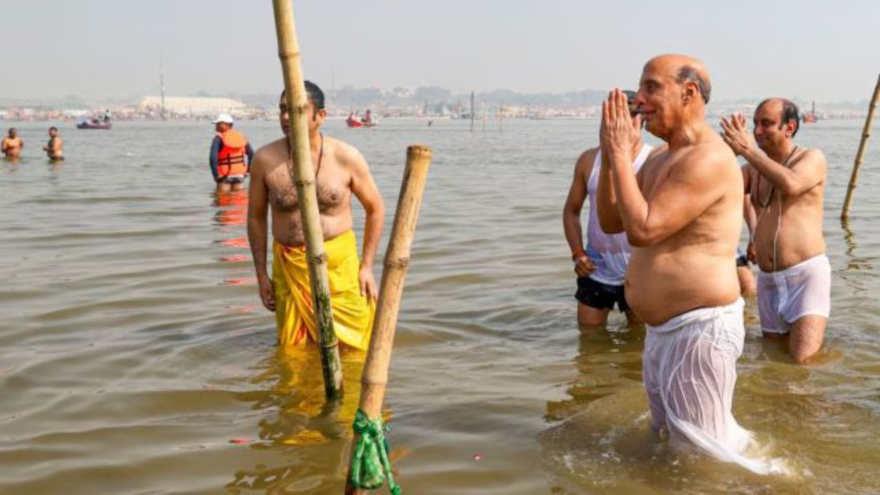 Rajnath Singh Immerses in Spiritual Waters